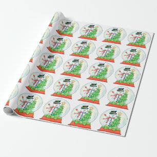 Snowman in een sneeuwWereldbol met kerstboom Cadeaupapier