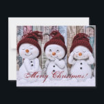 Snowman met feestdag voor kerst feestdagenkaart<br><div class="desc">Een mooie winterscène met sneeuwmannen.  witte sneeuw met vrolijk kerstfeest in script. Schattig en stijlvol.</div>