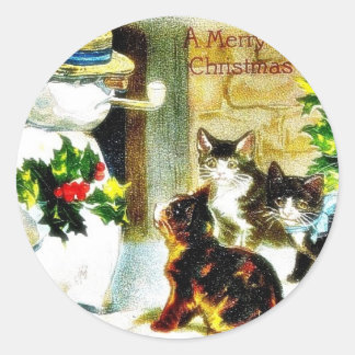 Snowman met heilige bladeren en katten rond ronde sticker