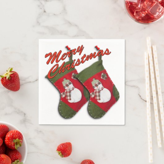 Snowman met kerstcadeautjes over wit servetten (Insitu)