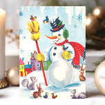 Snowman met kerstmis bij dieren Feestdagen Kaart<br><div class="desc">Vier het vakantieseizoen met deze charmante vintage kerstkaart met een vrolijke sneeuwpop omringd door schattige beesten. De grillige scène omvat vogels, eekhoorns en een konijn, allemaal geplaatst tegen een kleurrijke winter dorp achtergrond. Deze nostalgische vakantiekaart vangt de magie en onschuld van een klassieke kerst, perfect voor het sturen van warme...</div>