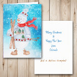 Snowman Skier Kerstmis Feestdagen Kaart<br><div class="desc">De voorkant van deze kerstkaart heeft een waterverf afbeelding van een schattige sneeuwman gekleed in een wintertrui, pet en sjaal. Hij houdt zijn ski's en skistokken vast en wordt op een helderblauwe abstracte sneeuwlaag en sterachtergrond geplaatst. In de kaart bevinden zich tekstvelden die u kunt aanpassen aan alles wat u...</div>