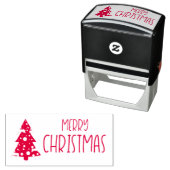 Snowy kersttekst met snowy kerstboom zelfinktende stempel (In situ)