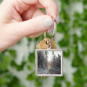 Snowy modderweg die de zon in gaat sleutelhanger (Hand)