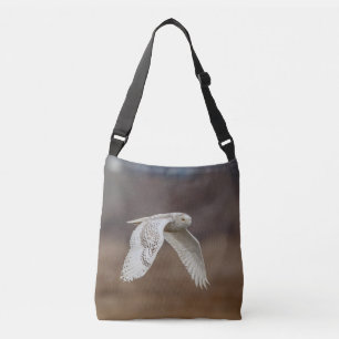 Snowy owl tijdens de vlucht crossbody tas