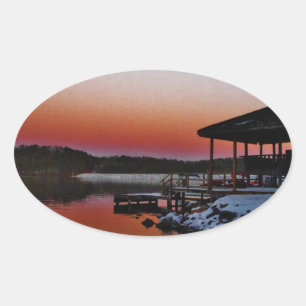 Snowy Sunset at Lake Arrowiad dock Ovale Sticker