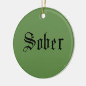 Sober kerstversiering, groen keramisch ornament (Links)