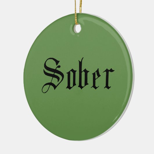 Sober kerstversiering, groen keramisch ornament (Links)