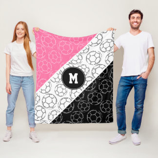 soccer balls line art pattern on pink black fleece deken