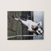 Soccer goalie vangt voetbal legpuzzel (Horizontaal)