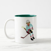 Socket Monkey Hockey Player Tweekleurige Koffiemok (Links)
