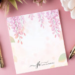 Soft Wisteria Waterverf Bloemen gepersonaliseerd Notitieblok<br><div class="desc">Dit gepersonaliseerde notitieblok is voorzien van delicate, trapsgewijze wisteria-bloemen in zachte pasteltinten, waardoor een sereen en elegant waterverf-ontwerp ontstaat. Perfect voor liefhebbers van bloemen, tuinliefhebbers en degenen die romantische briefpapier waarderen. Pas de tekst aan de onderkant aan voor een persoonlijk tintje, waardoor deze ideaal is voor journaling, notities maken of...</div>