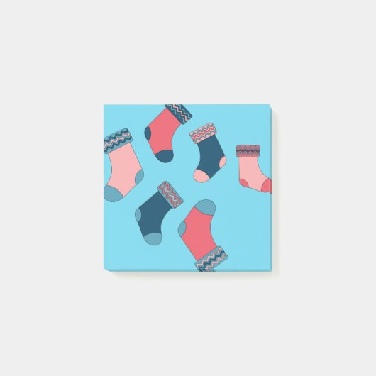 Sokken voor kerstinslag op blauwe achtergrond post-it® notes (Voorkant)