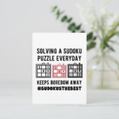 Solving a sudoku puzzle a everyday   briefkaart (Staand voorkant)