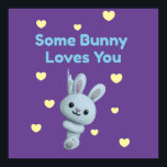 Some Bunny Loves You Poster<br><div class="desc">Spread love and festive cheer with the Some Bunny Loves You poster! 🐰💜💛 Featuring a cheerful bunny surrounded by sweet yellow hearts and playful text, this design is perfect for nurseries, kids’ rooms, or seasonal Easter décor. Its vibrant colors and affectionate message make it a delightful wall accent that brightens...</div>