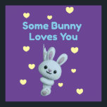 Some Bunny Loves You Poster<br><div class="desc">Spread love and festive cheer with the Some Bunny Loves You poster! 🐰💜💛 Featuring a cheerful bunny surrounded by sweet yellow hearts and playful text, this design is perfect for nurseries, kids’ rooms, or seasonal Easter décor. Its vibrant colors and affectionate message make it a delightful wall accent that brightens...</div>