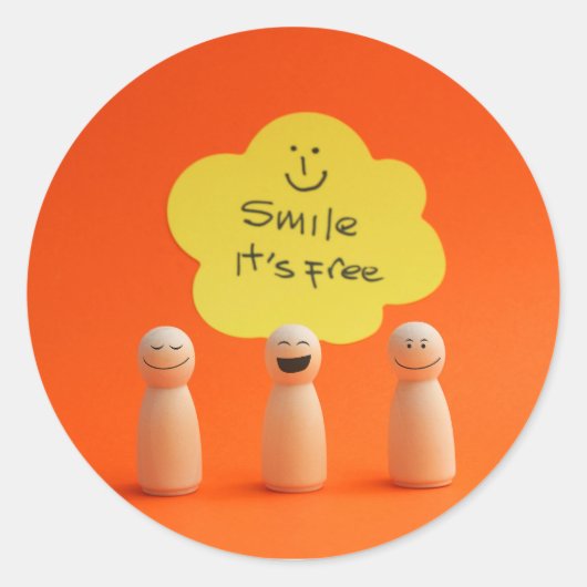 Sonríe, es gratis ronde sticker (Voorkant)