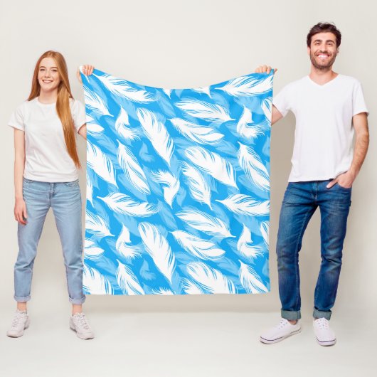 Sophisticated Feather Design On A Bright Blue Fleece Deken (In situ)