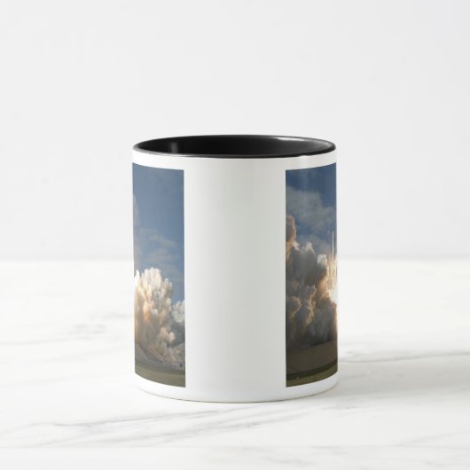 Space Shuttle Atlantis tilt af 24 Mok (Midden)