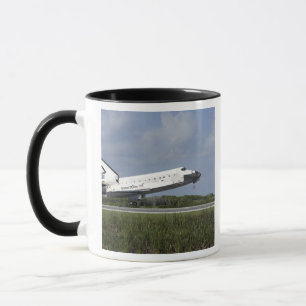 Space shuttle Discovery landt op Runway 33 Mok