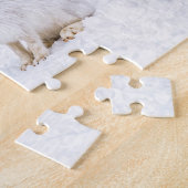 Spaniel ontmoet sneeuwhaas in winterbos legpuzzel (Zijkant)