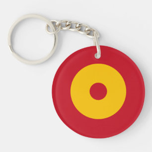 Spanje: vlaggen rond ronde cirkel, symbool arm sleutelhanger