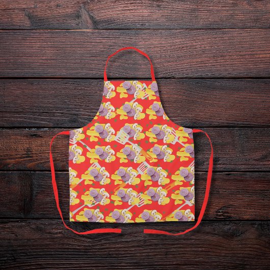 Spatels en roerei rood schort