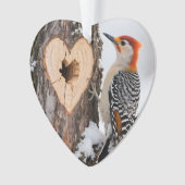 Specht naast hartvormig boomgat ornament (voorkant)