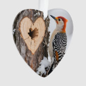 Specht naast hartvormig boomgat ornament (voorkant)