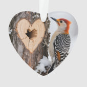 Specht naast hartvormig boomgat ornament (achterkant)