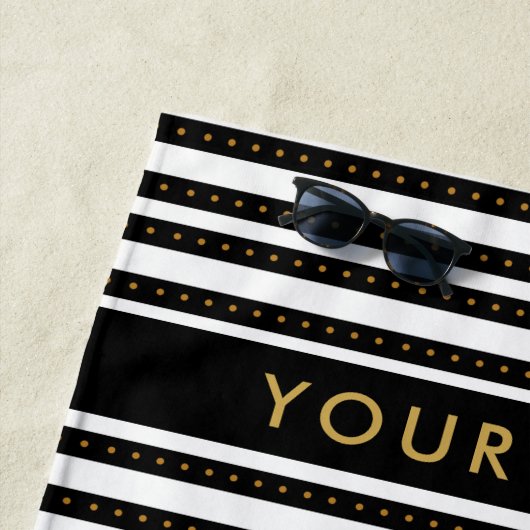 Speciaal goud, zwart en wit gestreept strandlaken (In situ)