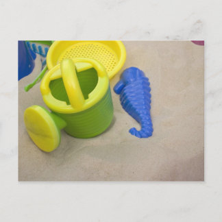 Speelgoed op het strand briefkaart