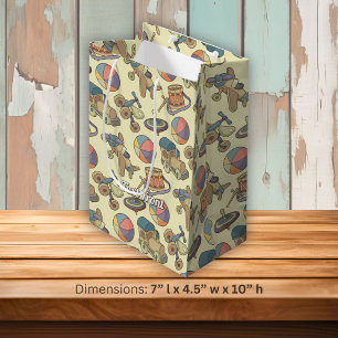 Speelgoed pictogrammen achtergrond medium cadeauzakje