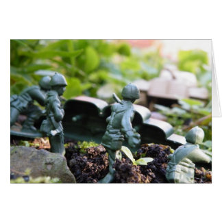 speelgoed soldaten nemen de tank op