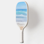 Speelgolven op een zonnige dag in het strand pickleball paddle (Links)