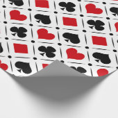 Speelkaart past bij symbolen cadeaupapier (Hoek)