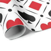 Speelkaart past bij symbolen cadeaupapier (Rol Hoek)