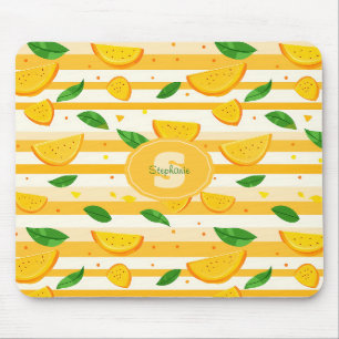 Speels Oranje snijpatroon met groene bladeren Muismat