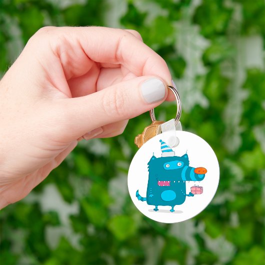 Speelse Blauwe Cartoon Monster met Feesthoed Sleutelhanger