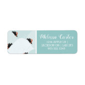 Speelse Pinguïns Glijden op Sneeuwpatroon Etiket (Voorkant)