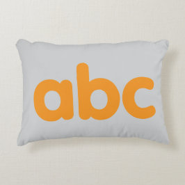 Speelse primaire ABC kussen