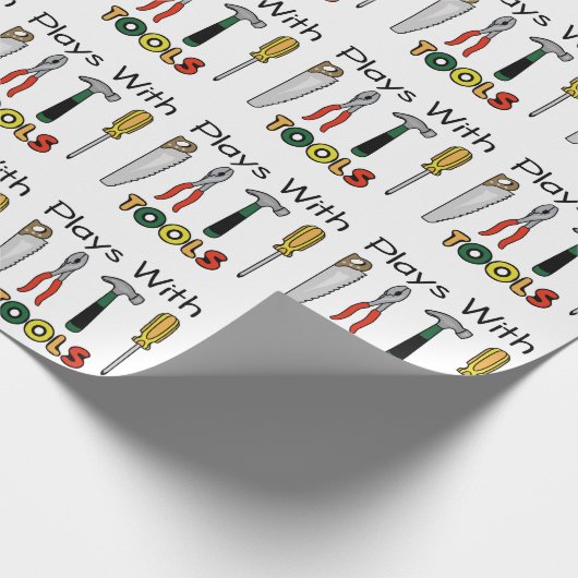 Speelt met gereedschap af cadeaupapier (Hoek)