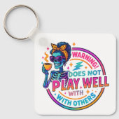 Speelt niet goed… sleutelhanger (Voorkant)