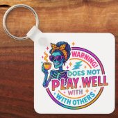 Speelt niet goed… sleutelhanger (Voorkant)