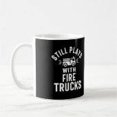 Speelt nog steeds vast met vuurwerktuigen koffiemok (Links)