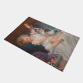 Speeltijd: Meisje speelt met haar dichter Kitten Deurmat (Schuin)