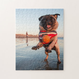 Spelbak op strand afspelen legpuzzel