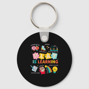 Spelen is het leren van de kleuterschool sleutelhanger