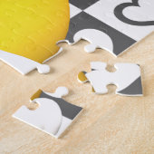 Spelend puzzelvingers op het haar met hart legpuzzel (Zijkant)