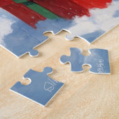 Sphynx kat loopt in de sneeuw met kerstmuts legpuzzel (Zijkant)